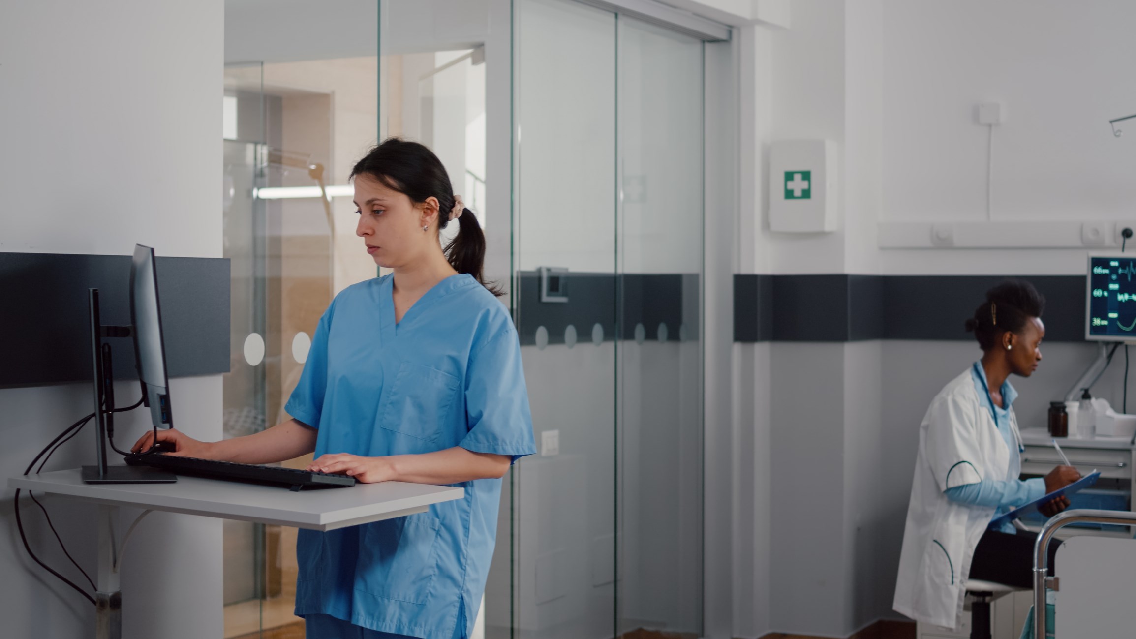 Nurse and Doctor working at the hospital.